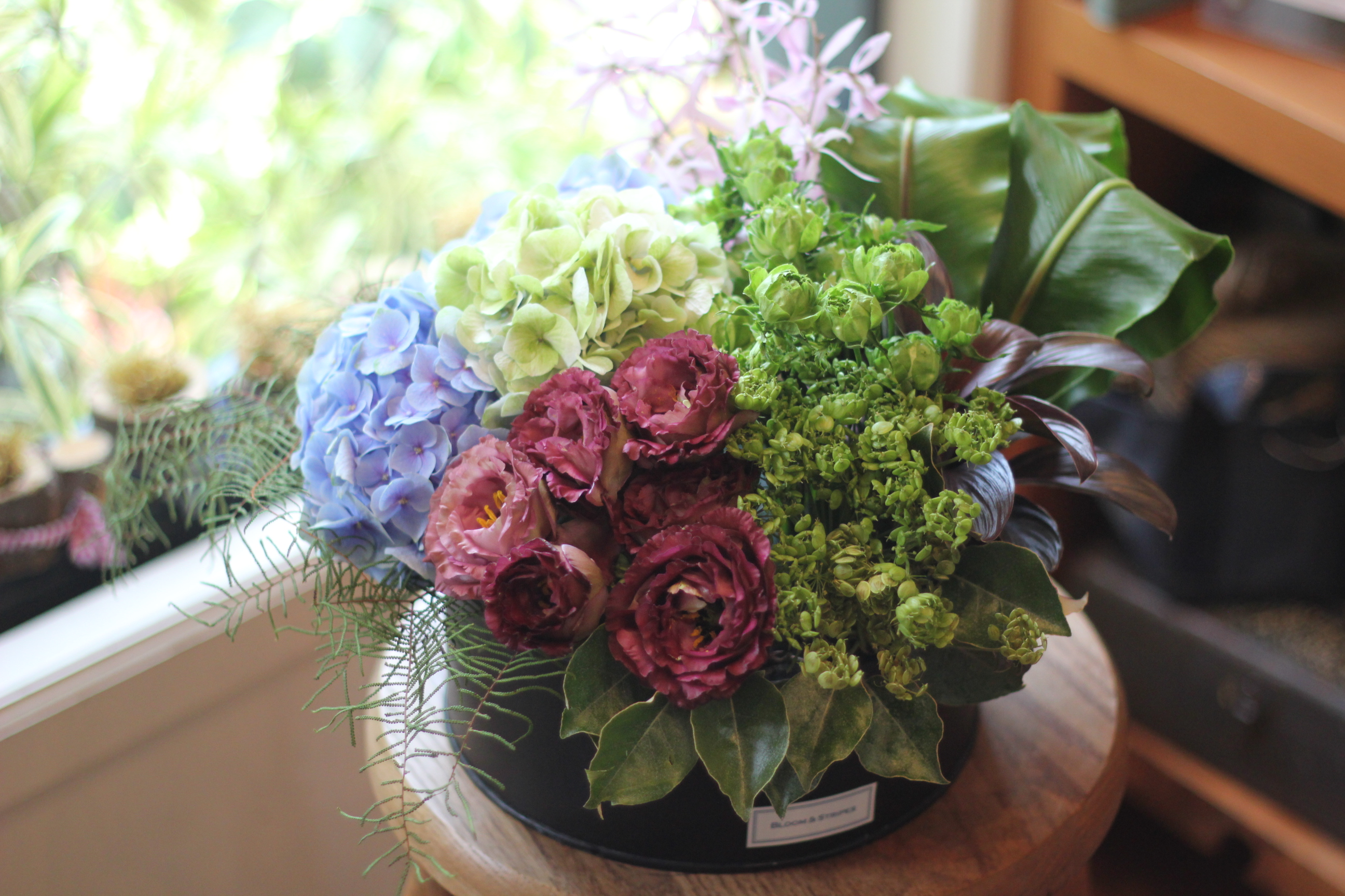 【季節のフラワーアレンジメント】ローラウンド12000