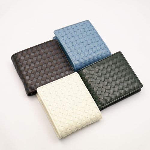 ﾗﾑ革編込み二つ折り財布