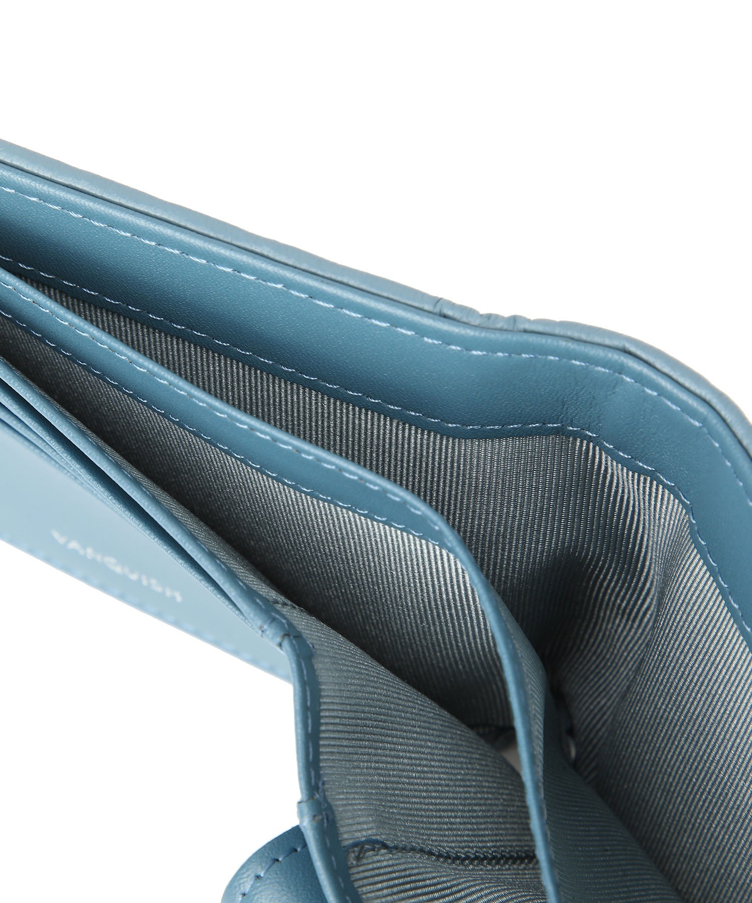 ﾗﾑ革編込み二つ折り財布