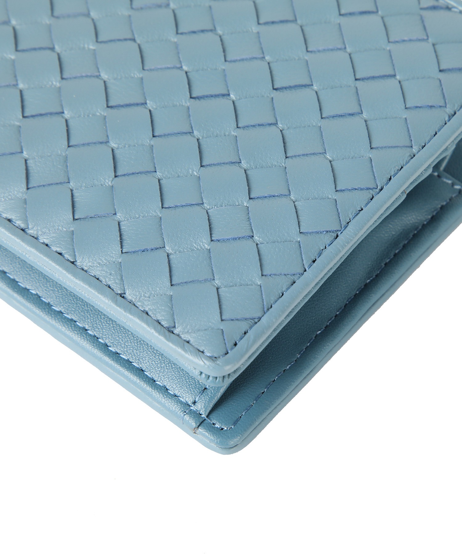 ﾗﾑ革編込み二つ折り財布