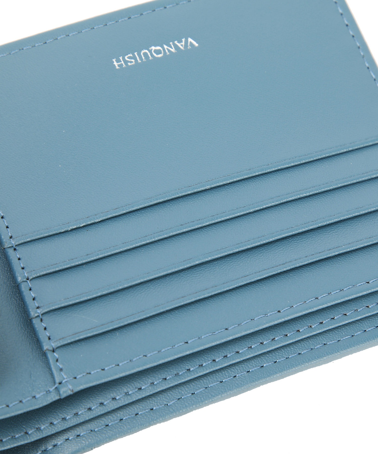 ﾗﾑ革編込み二つ折り財布