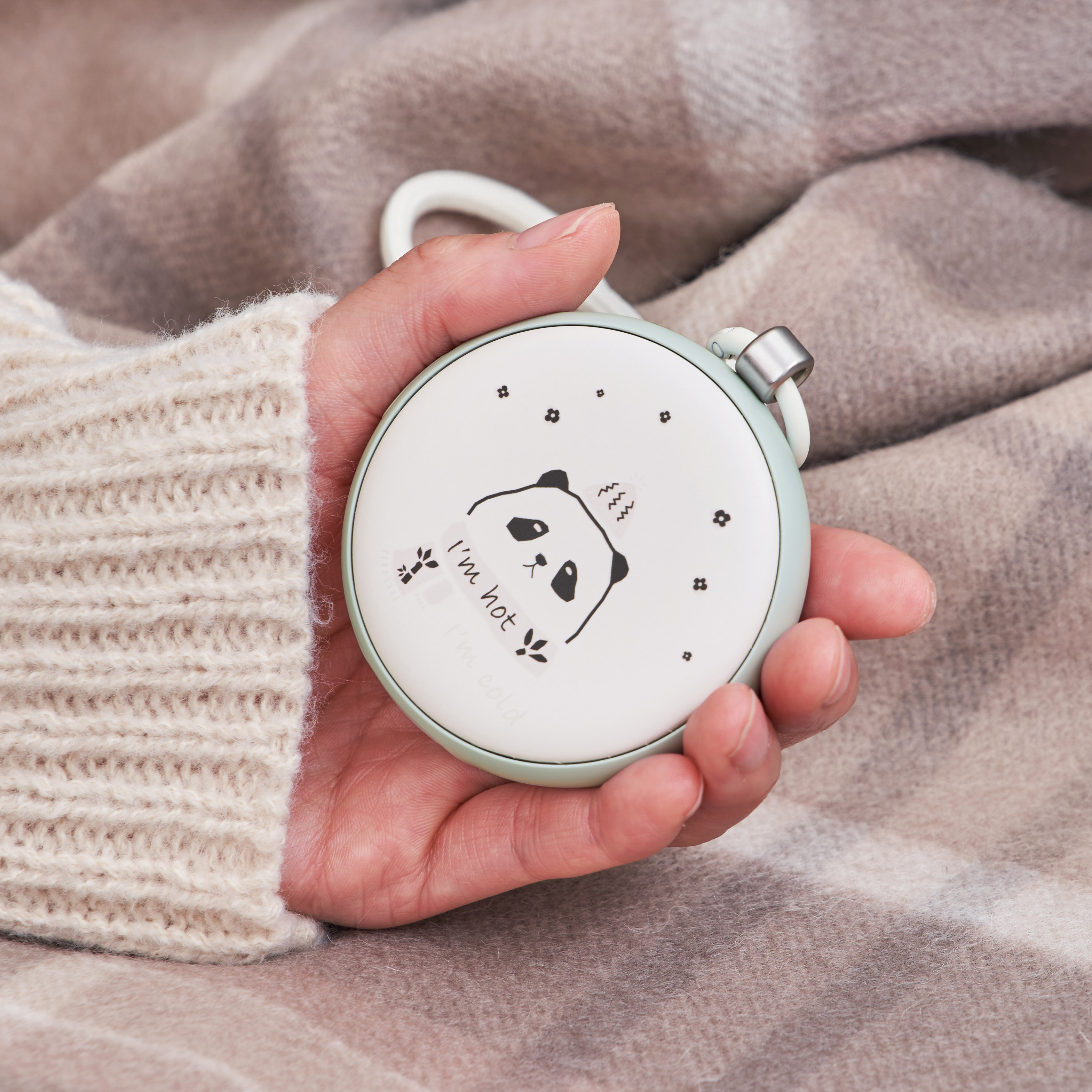 温度変化でデザインが変わる使い捨てないカイロLEDライト付