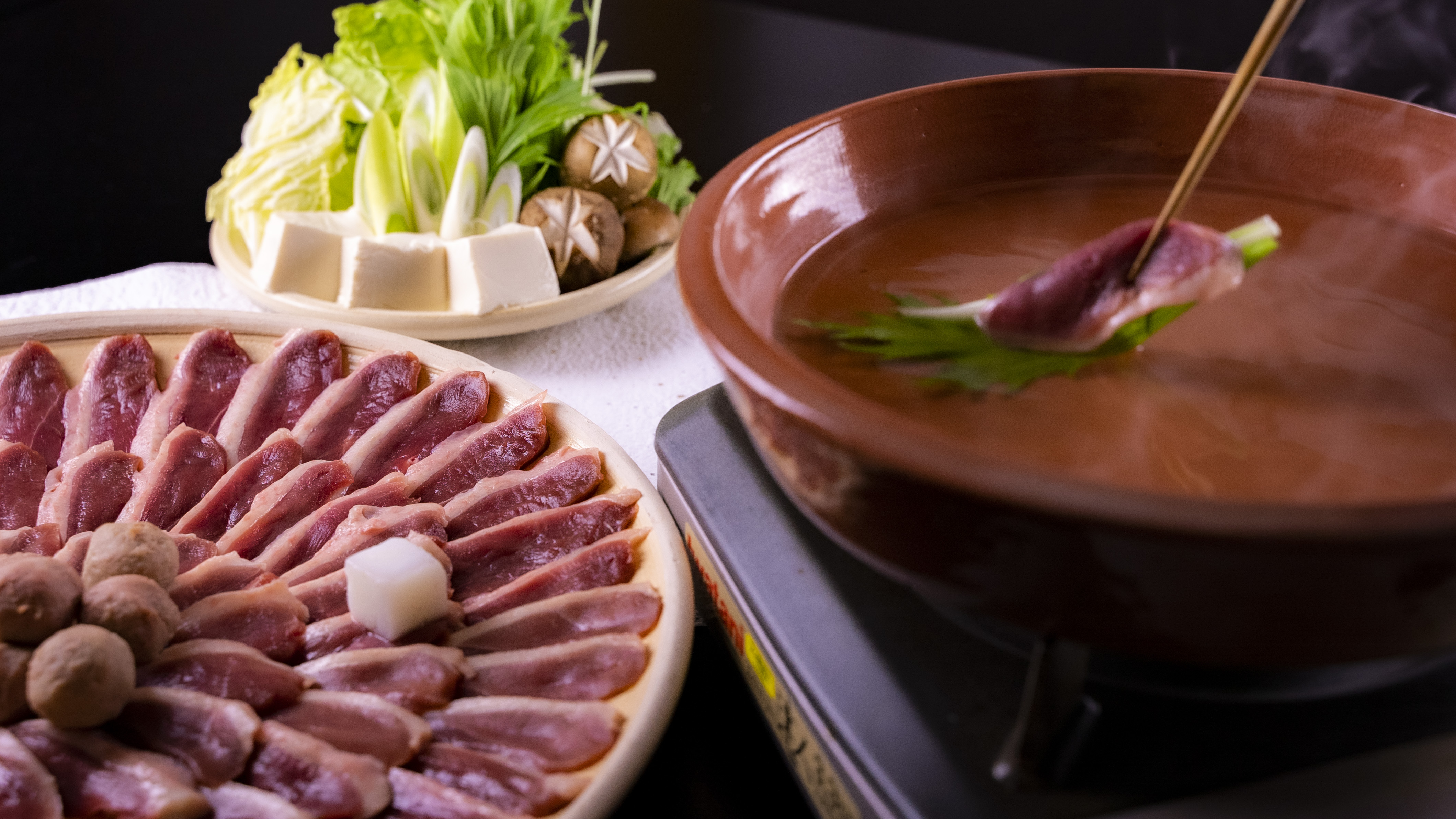鴨とつくねのトリュフ出汁しゃぶしゃぶ　そば付き