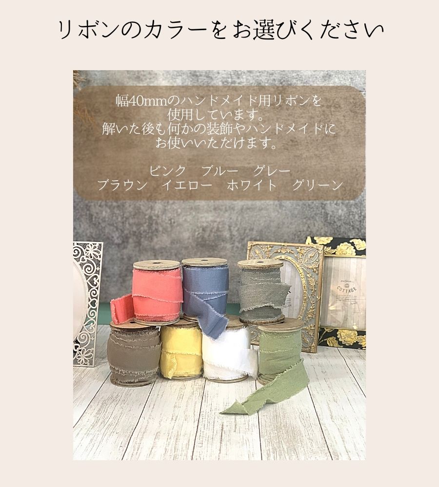 蝶ネクタイスタイの入った名入れおむつバスケット