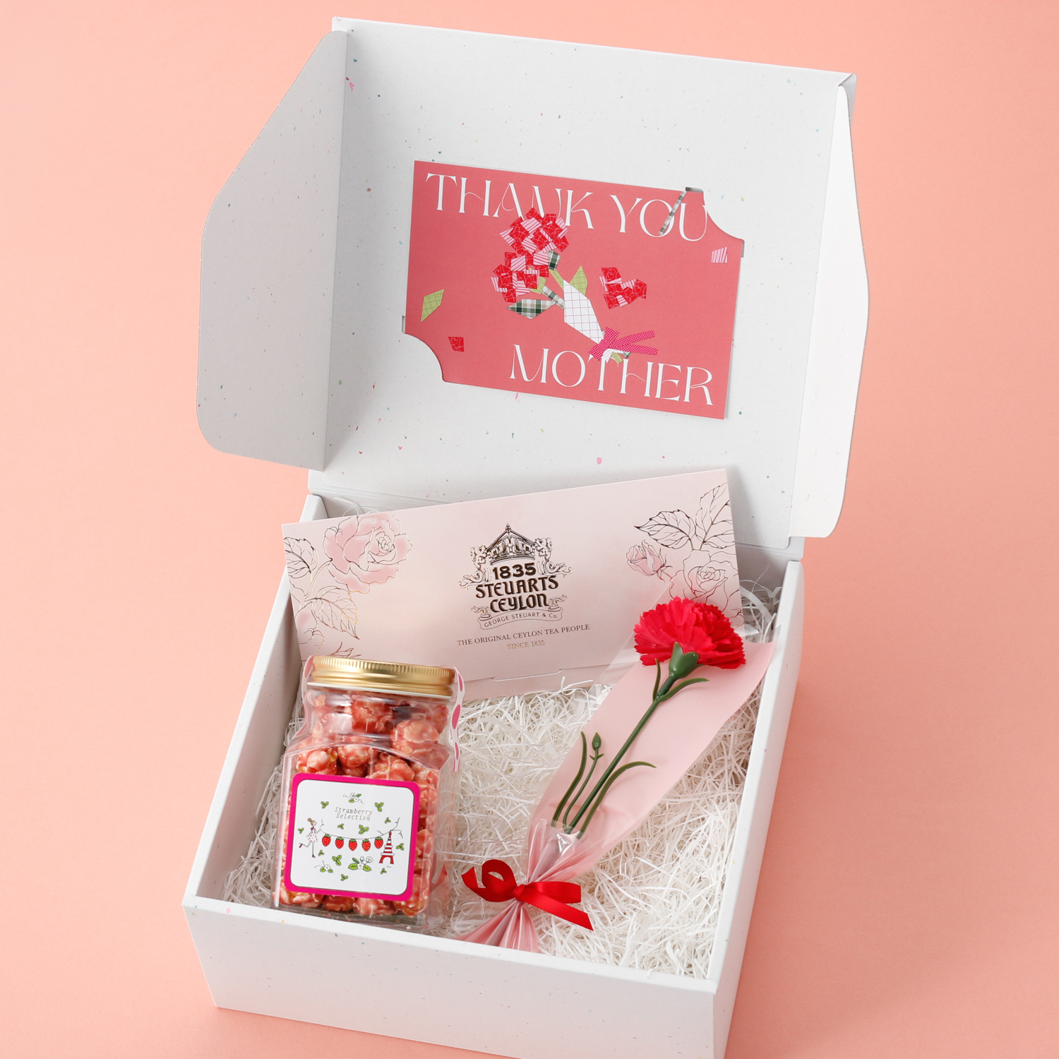 〈母の日ボックス＋カーネーションセット〉ファーストクラスで採用された紅茶といちごのポップコーンのセット